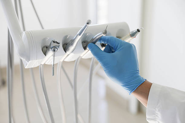 Professional Emergency Dentist technician working in Oklahoma City, OK